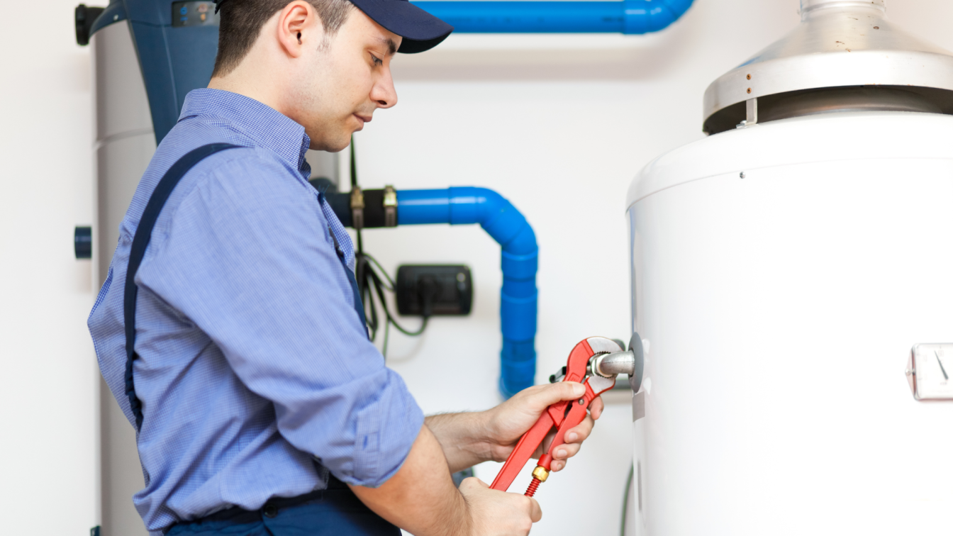 Plumber installing tankless water heater and water filtration system in Capital Region NY